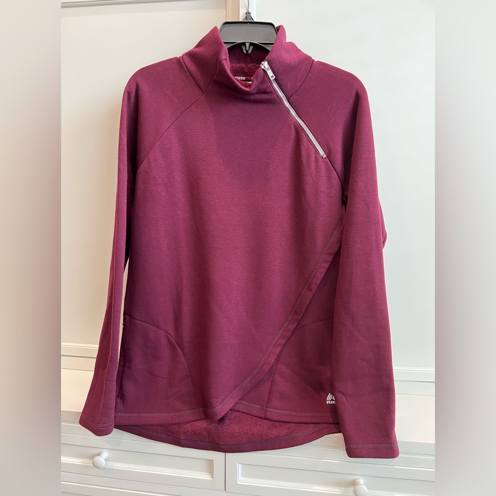 Women’s RBX Mock neck asymmetrical zip pullover, size Medium